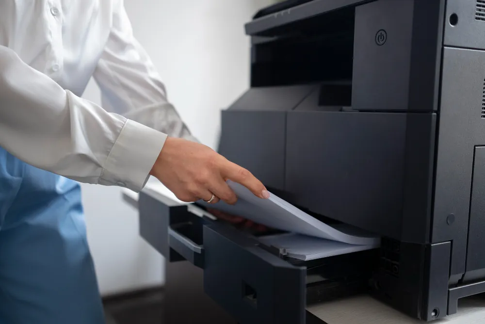 quitar papel atascado impresora